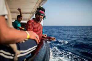 Migranten op zee. beeld AFP