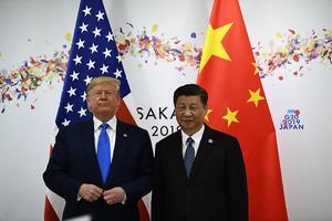 Donald Trump en Xi Jinping. beeld AFP