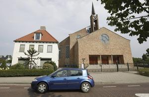 Het Kerkelijk Bureau van de Gereformeerde Gemeenten in Nederland, met het kerkgebouw in Opheusden. beeld Vidiphoto