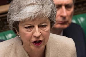 De Britse premier Theresa May, gisteren in het Britse Lagerhuis. beeld AFP