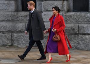De Britse prins Harry en zijn vrouw Meghan tijdens een bezoek aan Birkenhead. beeld AFP