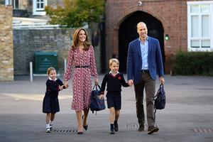 De Britse prins William en zijn vrouw Catherine met prins George en prinses Charlotte. beeld AFP