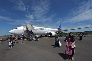 De stewardess zegt rustig: „Nu is het tijd om te bidden.” beeld AFP, Adek Berry