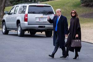 De Amerikaanse president Donald Trump en zijn vrouw Melania. beeld EPA