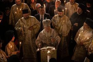 De oosters-orthodoxe patriarch Bartholomeus tijdens de paasviering in april. beeld AFP, Tolga Bozoglu
