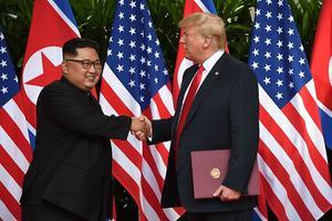 De leiders van Noord-Korea en de VS hebben elkaar al eerder ontmoet. beeld AFP