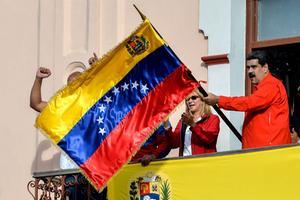 De Venezolaanse president Maduro wil nog geen afstand doen van de macht. beeld AFP, Luis Robayo