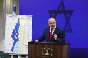 De Israëlische premier Netanyahu beloofde dinsdag annexatie Jordaanvallei. beeld EPA, Abir Sultan