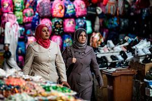 Markt in de Koerdische stad Qamishli, 10 september. beeld AFP, Delil Souleiman