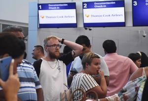 Paniek! De incheckbalie op de internationale luchthaven in Cancun, Mexico, blijkt gesloten. beeld AFP, Elizabeth Ruiz