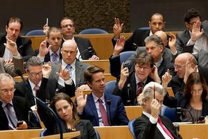 De PVV-fractie tijdens een stemming. beeld ANP, Robert Vos