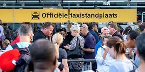 Drukte op Schiphol door de storing. beeld ANP
