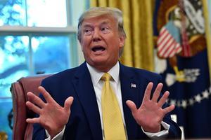 President Trump, zelfbenoemd stabiel genie. beeld AFP, Nicholas Kamm