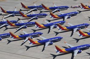 Boeing 737 MAX's aan de grond op een vliegveld in Californië. beeld AFP
