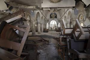 Een door IS verwoeste kerk in Qaraqosh, dertig kilometer van Mosul. beeld AFP, Thomas Coex
