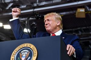 Evangelicalen zijn verontrust over het gevloek van president Donald Trump tijdens een verkiezingsbijeenkomst in Greenville. beeld AFP, Nicholas Kamm