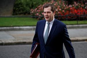 Robert Jenrick, de Britse minister van Wonen. beeld AFP, Tolga Akmen