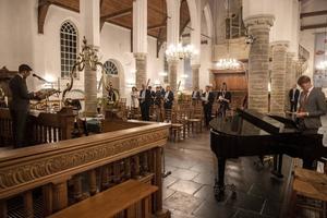 Prof. dr. W. van Vlastuin hield dinsdagavond in de Dorpskerk in Abcoude een lezing over de Latijnse uitdrukking ”semper reformanda”. Hij sprak ter gelegenheid van de 121e dies natalis van de Gereformeerde Theologen Studentenvereniging Voetius (GTSV). beeld Erik Kottier