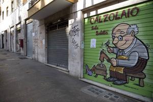 Gesloten winkels in Rome. De maffia proberen een voet tussen de deur te krijgen bij ondernemers. beeld EPA, Maurizio Brambatti