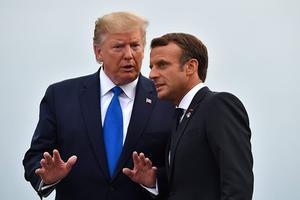President Trump (l.) met zijn Franse ambtsgenoot Macron. beeld AFP