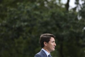 De Canadese premier Trudeau ligt onder vuur wegens een vermeende racistische foto uit 2001. beeld AFP, Dave Chan