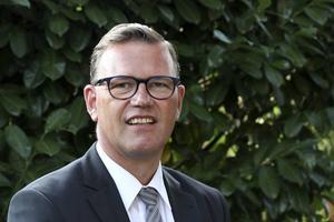 Ds. A. J. Mensink.  beeld HOE