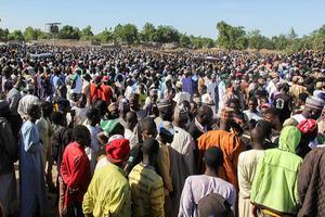 Begrafenis van arbeiders die werden gedood door Boko Haram. beeld AFP, Audu Marte