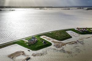 Dronefoto van de Noordwaard Polder in de Biesbosch. In het gebied wordt water opgevangen uit rivier de Boven Merwede vanwege de hoge waterstand. beeld ANP