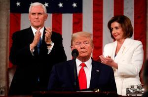 „De vijanden van Amerika zijn op de vlucht, de rijkdom van Amerika neemt toe, de toekomst van Amerika ziet er rooskleurig uit”, aldus de Amerikaanse president Donald Trump. beeld AFP