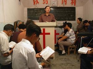 Een kleine huiskerk in het dorpje Wuhu, China. beeld EPA, Karl Goh