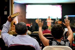 Bijeenkomst in een evangelische kerk in Brasilia. beeld AFP, Evaristo SA
