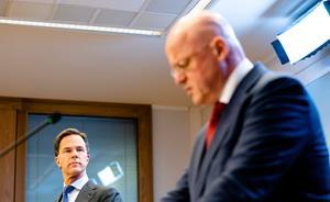 Premier Mark Rutte (l.) en Ferdinand Grapperhaus van Justitie en Veiligheid. beeld ANP