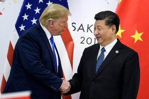 President van de VS Donald Trump en Chinese leider Xi Jinping tijdens een ontmoeting in juni dit jaar. beeld AFP