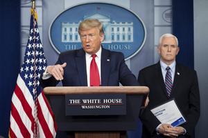President Donald Trump en vicepresident Mike Pence riepen de christenen op om de „smartphonetijden” in te wisselen voor gebedstijden. beeld AFP, Jim Watson