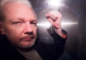 Assange. beeld AFP
