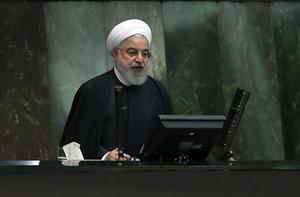 De Iraanse president Rohani benadrukt dat Iran oliesmokkel zal blijven bestrijden. Iran braxcht maandag opnieuw een schip in de Perzische Golf op. beeld AFP