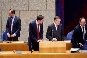 Minister Bruno Bruins (tweede van rechts) tijdens het debat in de Tweede Kamer. beeld ANP