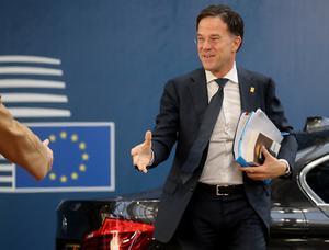 Rutte voorafgaand aan de begrotingstop. beeld EPA