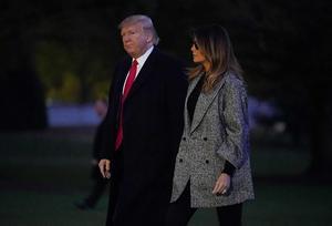 De Amerikaanse president Donald Trump en first lady Melania Trump. beeld AFP
