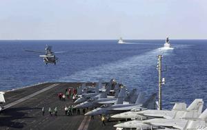 Het Amerikaanse vliegdekschip USS Abraham Lincoln passeert de Straat van Hormuz, in de buurt van de Iraanse kust. President Donald Trump zou vorige week hebben overwogen nucleaire installaties van Iran aan te vallen. beeld AFP, US Navy, Stephanie Contreras