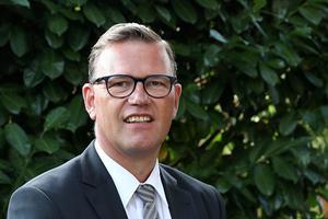 Ds. A. J. Mensink. beeld HOE