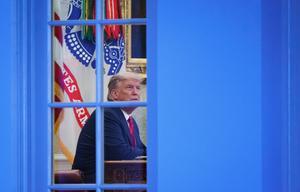 De Amerikaanse president Trump in het Witte Huis. beeld AFP, Mandel Ngan